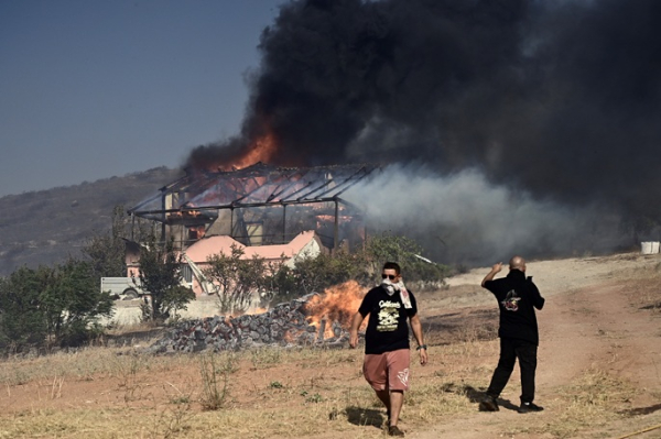 Wildfires ravage Greece amid strong winds, leaving 1 dead Wildfires ravage Greece amid strong winds, leaving 1 dead