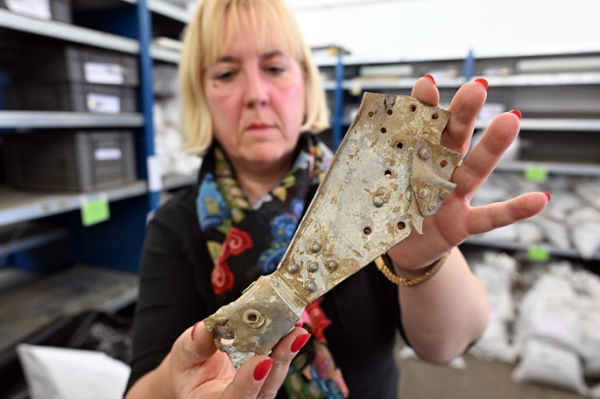 Archaeologists unearth wreckage of British WW II plane Archaeologists unearth wreckage of British WW II plane